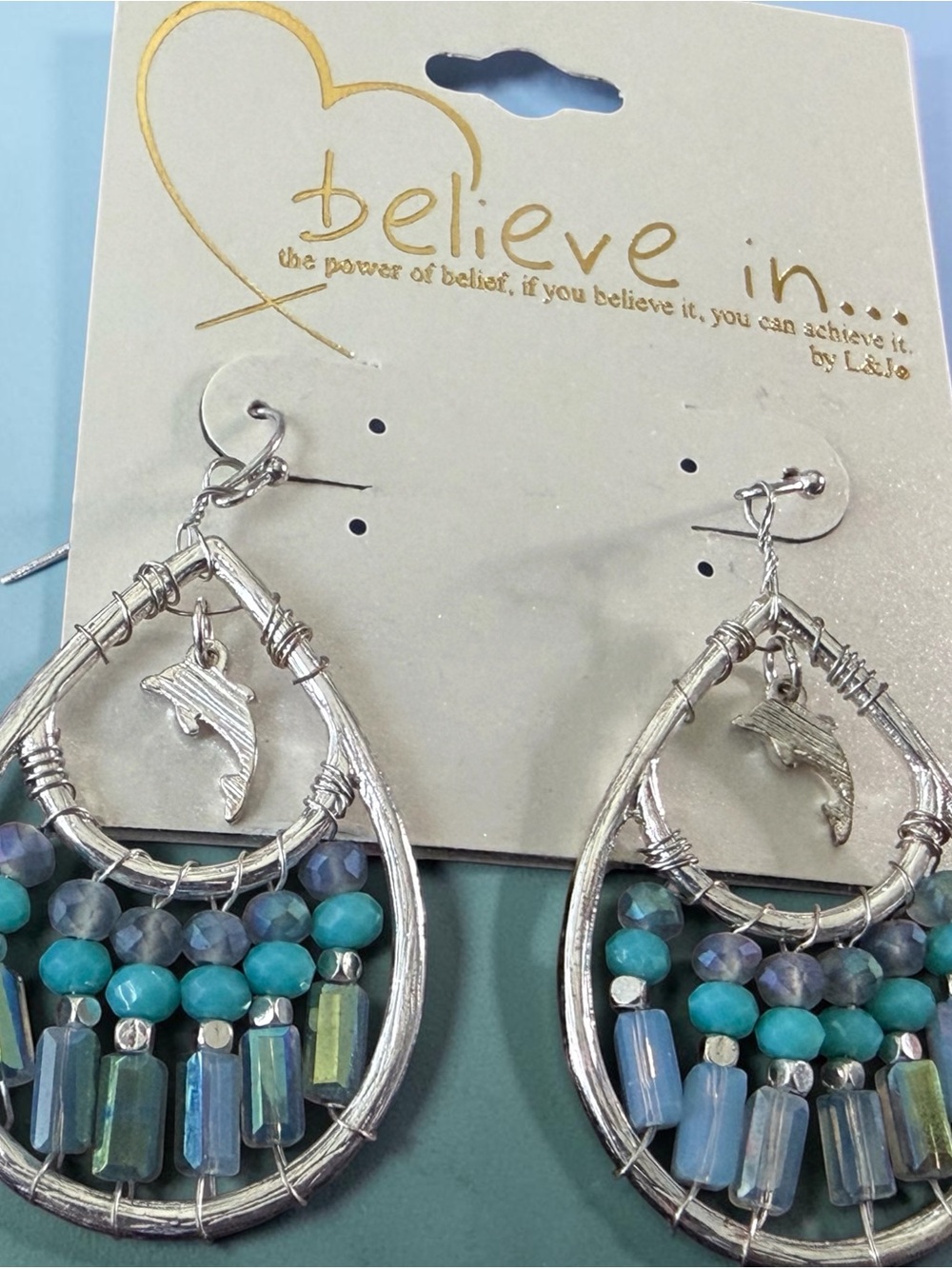 Beaded simulated turquoise crystal silver-toned Dolphin Charm Earrings 1 5/8”